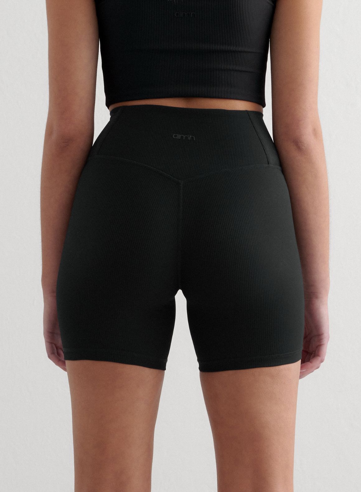 Co Activewear - Black Ribbed Performance Midi Biker Shorts fourth image