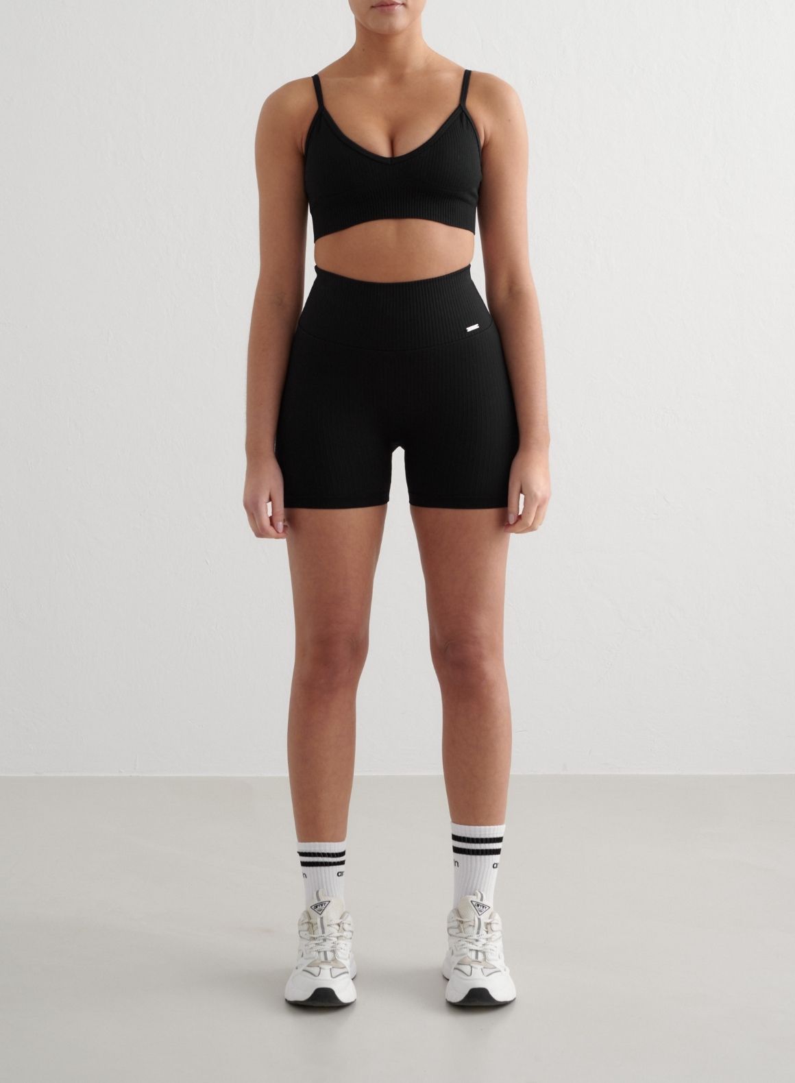 Co Activewear - Black Ribbed Seamless Deep Cut Bra fourth image