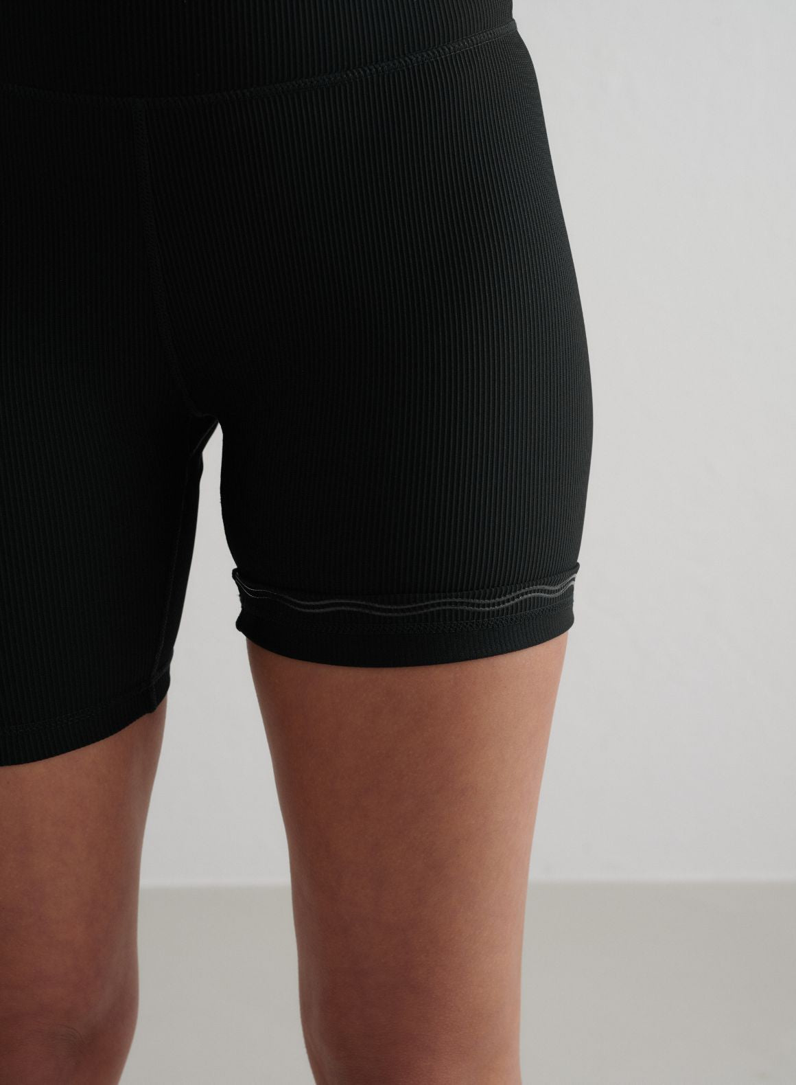 Co Activewear - Black Ribbed Performance Midi Biker Shorts fifth image