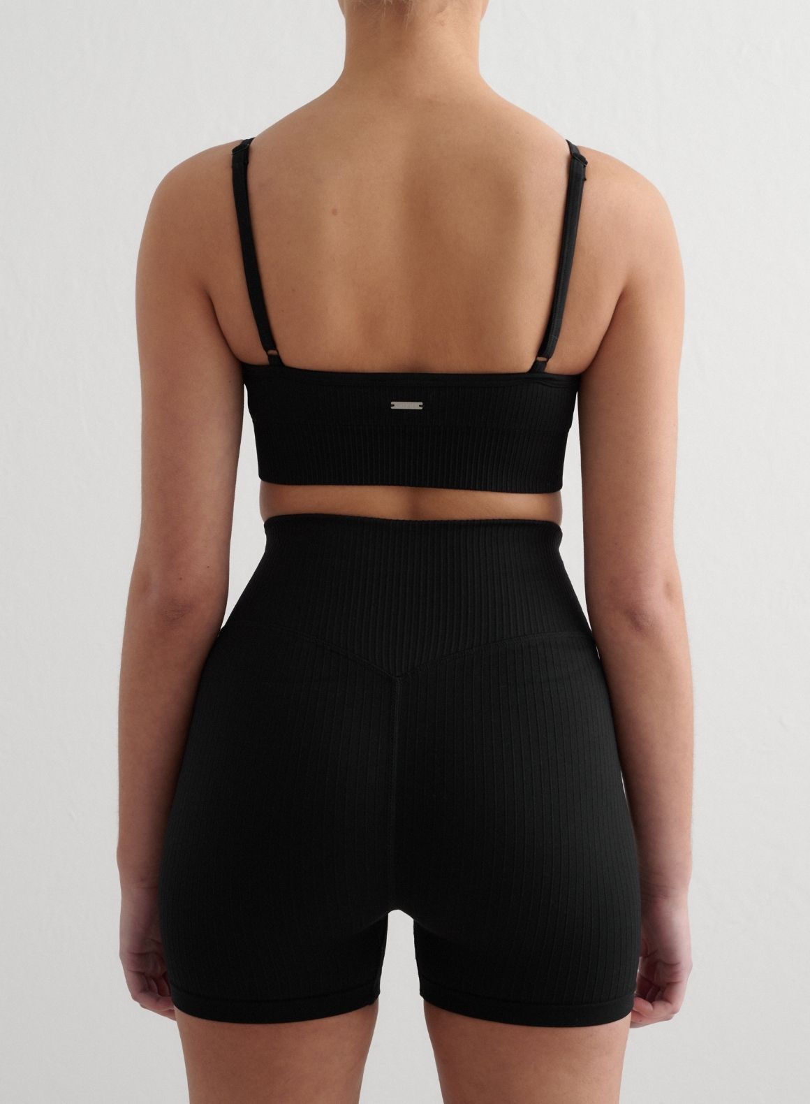 Co Activewear - Black Ribbed Seamless Deep Cut Bra third image